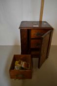 Late 19th or early 20th Century oak smokers cabinet with drawers to the interior