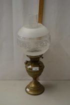 A brass based oil lamp