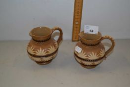 Pair of small Doulton jugs