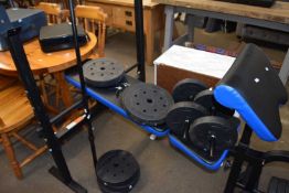 Weight lifting bench complete with a selection of various weights