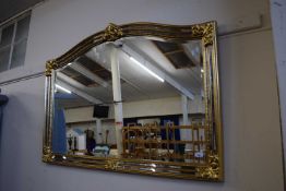 Modern gilt framed arched top mirror, 126cm wide