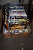 Two boxes containing various DVD movies