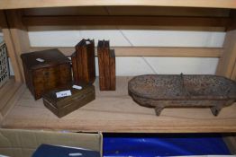 Pair of carved wooden book ends together with a plated cigarette box and a further miniature