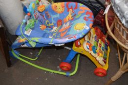 Child's bouncy chair together with toy trolley