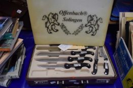 Attache case containing set of kitchen knives