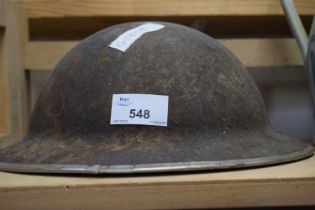 A vintage military helmet heavily corroded condition possibly from burial