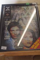 A framed and glazed magazine mock-up page, bearing the signature of X-Files creator, Chris Carter,