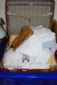 Vintage case containing a quantity of assorted vintage linens etc