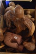 Box containing assorted wooden figures