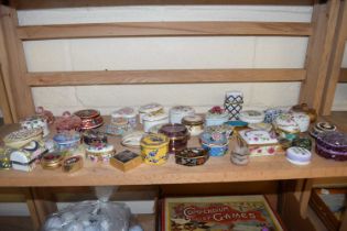Accumulation of various small pill boxes and trinket boxes