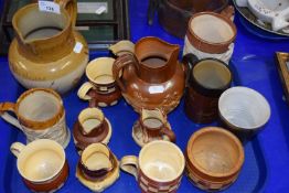 Collection of various stone ware tankards, jugs etc