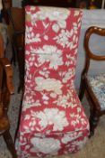 High back chair with floral cover