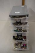 Five drawer plastic table top chest containing various assorted costume jewellery