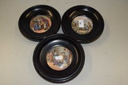 Three vintage Pratt ware pot lids in ebonised frames