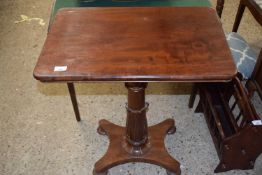 19th Century mahogany lamp table with rectangular top over a tapering column with four turned