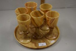 Polished onyx tray and six goblets