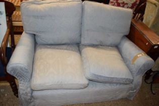 Blue upholstered two seater sofa