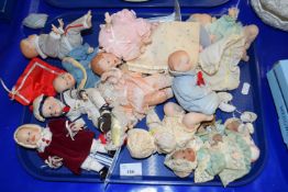 Collection of various modern porcelain headed baby dolls