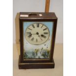 Vintage mantel clock, the case decorated with a winter scene