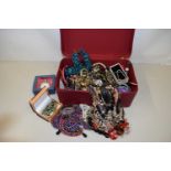 Red case containing various assorted costume jewellery