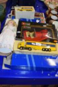 Collection of various Burago and other boxed toy vehicles together with modern porcelain headed