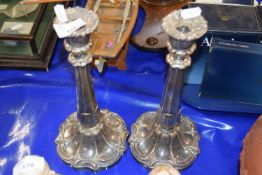Pair of silver plate on copper candlesticks