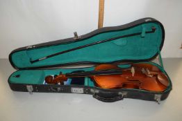 Cased violin