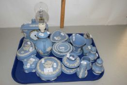 Collection of blue Wedgwood Jasper ware items to include trinket boxes, condiment items, mantel
