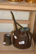 Vintage watering can and tasting cup