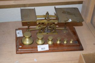 Pair of brass scales and weights