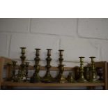 Mixed lot of brass ware to include candlesticks, table bells, money box etc