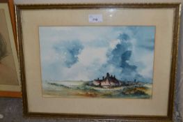 Watercolour study country cottages against a stormy sky, indistinctly signed, possibly Graham