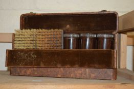 A gentleman's cased dressing table set
