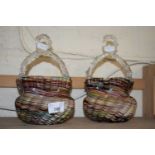 Pair of late 19th Century swirled glass baskets