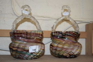 Pair of late 19th Century swirled glass baskets