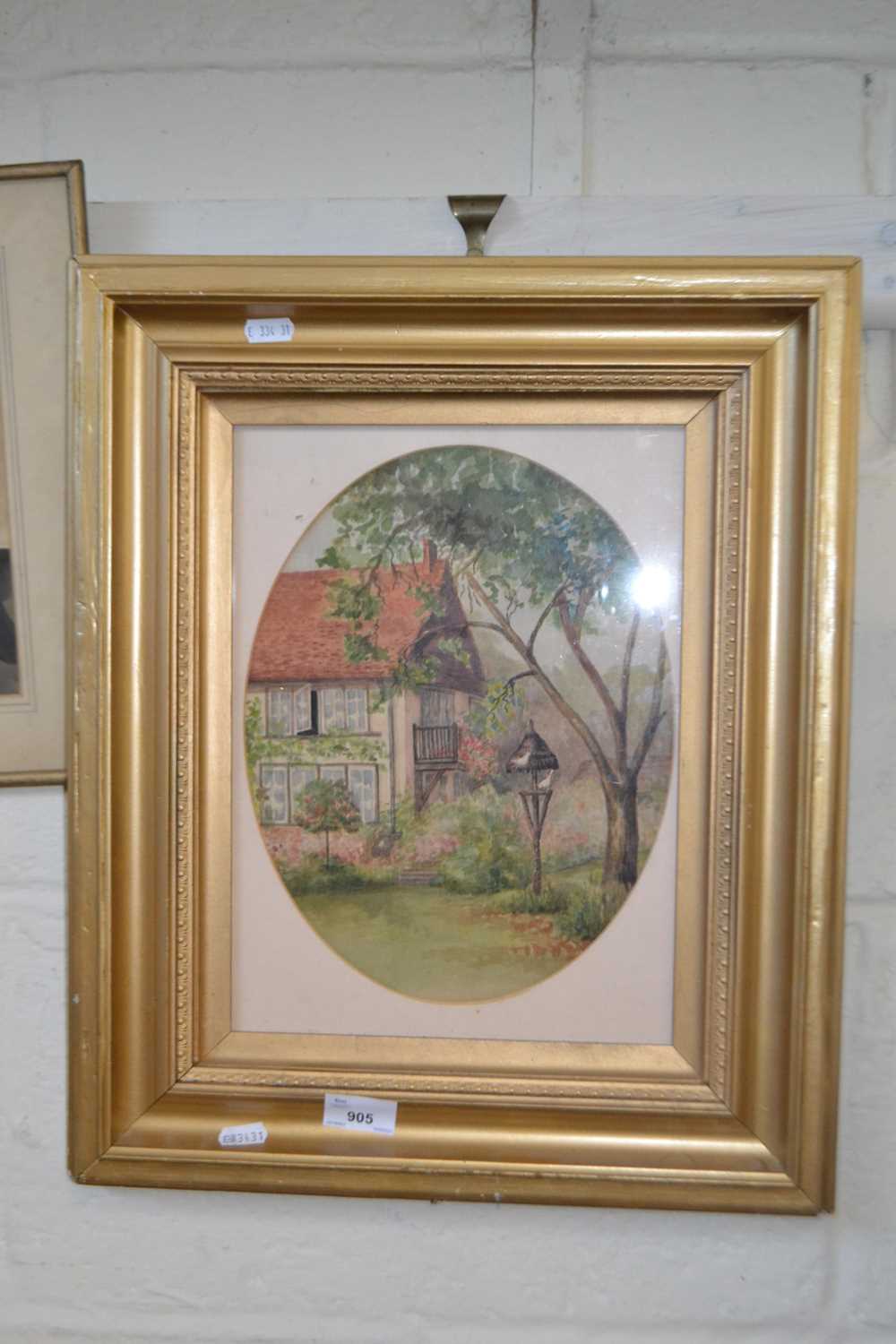 Watercolour of a cottage garden in gilt frame