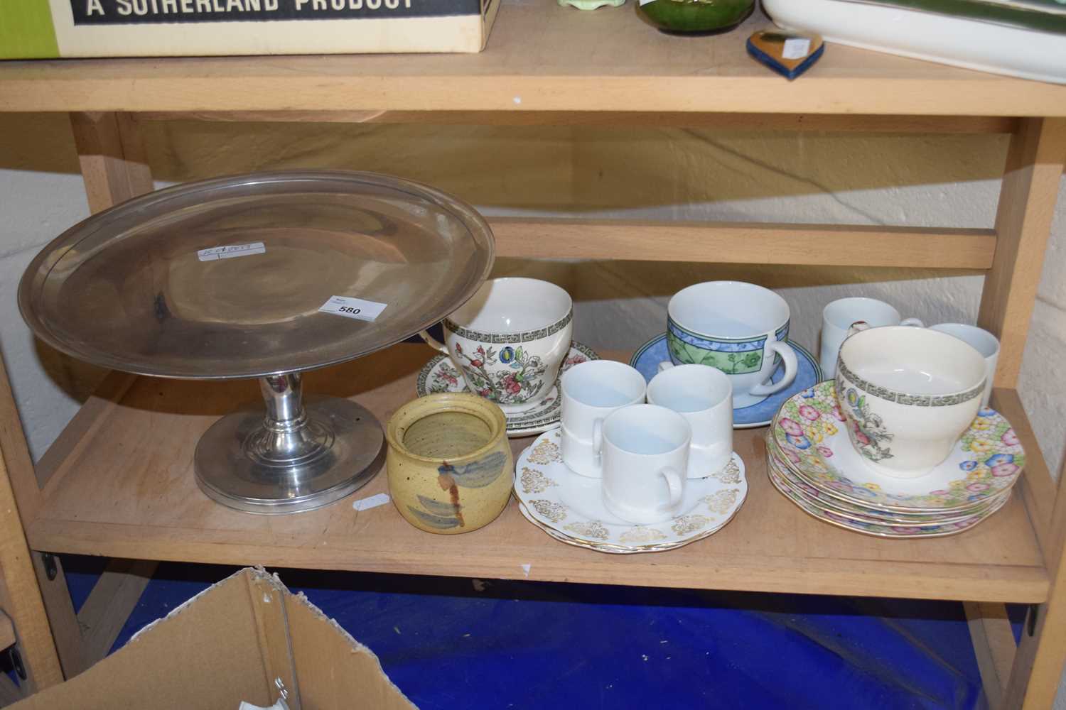 White metal ware cake stand together with a quantity of assorted tea wares
