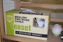 An English bone china floral decorated tea set, boxed