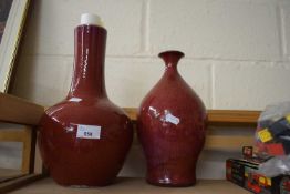 Two red glazed pottery vases by Robert Maxwell and David Creasey