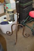 Wrought iron four footed stand