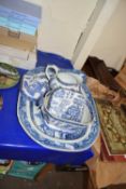 Blue and white serving dish together with other blue and white