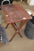 Folding wooden table