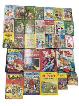 A collection of vintage children's books and annuals, to include: - Enid Blyton - Ladybird -