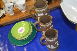 Graduated set of pottery jugs with applied decoration and other ceramics