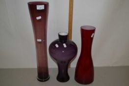 Three coloured glass vases