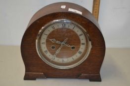Wooden mantel clock with silvered dial
