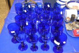 Quantity of Bristol blue glass wares including wine glasses, smaller liqueur glasses etc