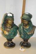 Pair of Egyptian style figures on black circular bases