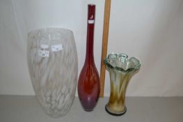 Three Studio Glass vases including a large vase with white streak design, a red coloured vase and