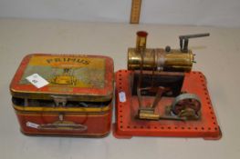 Vintage tin Primus box with contents, small Primus stove together with a Mamod steam engine